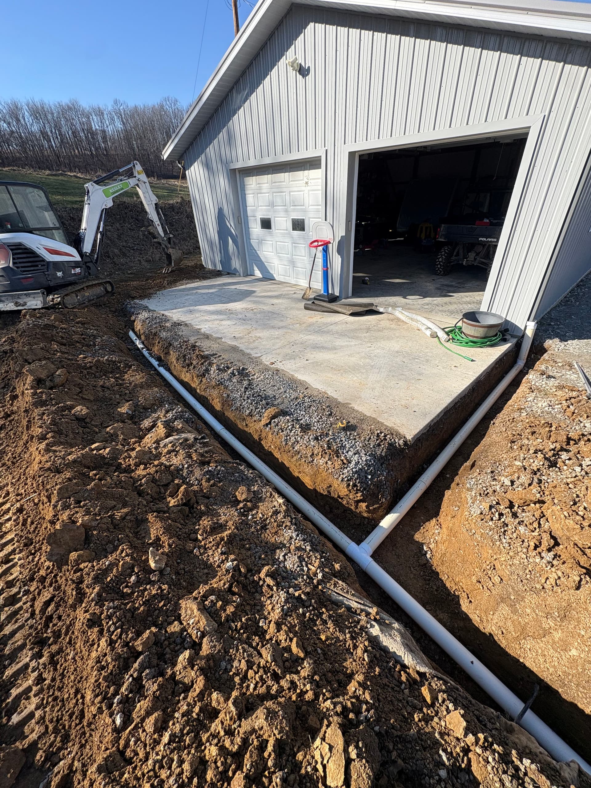 Gallery photos for Enhancing Driveway Functionality with Gravel and Downspouts: Image #2