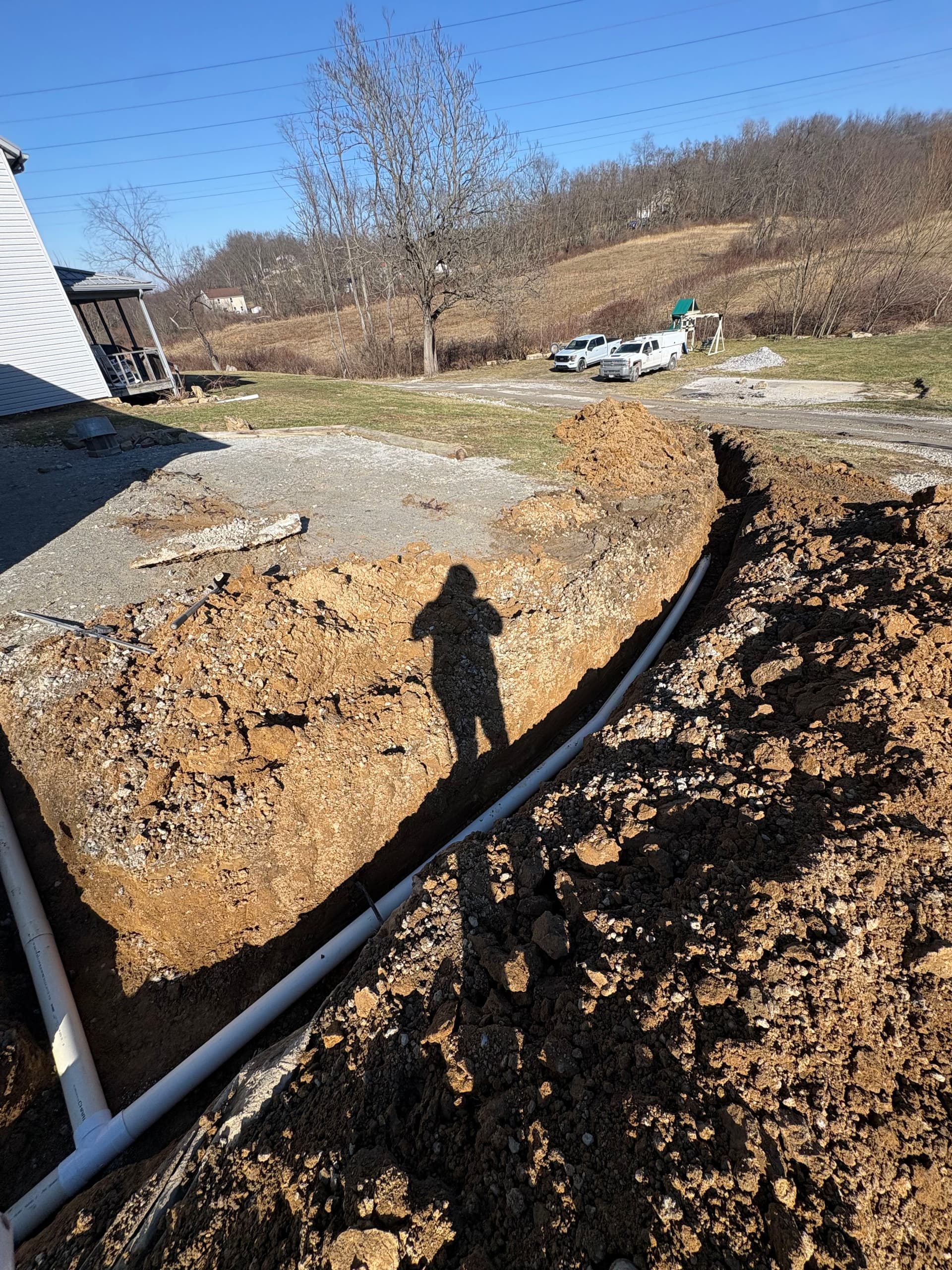 Gallery photos for Enhancing Driveway Functionality with Gravel and Downspouts: Image #3